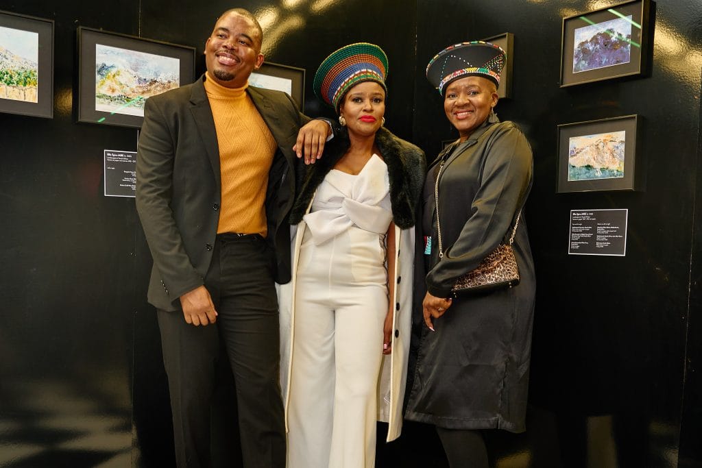 Guests exploring South African art inside the immersive art gallery in London at House of Sisters Grimm.