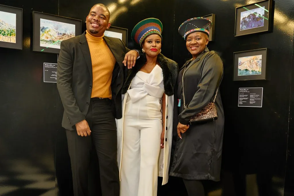 Guests exploring South African art inside the immersive art gallery in London at House of Sisters Grimm.