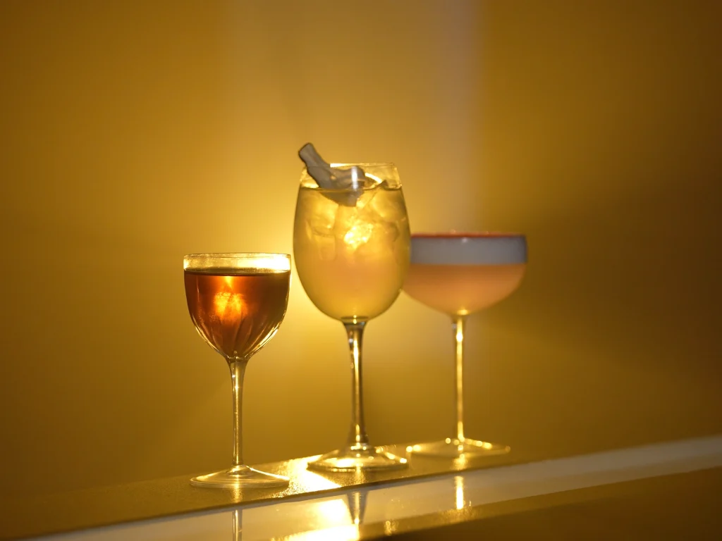 Artisanal cocktails in crystal glass at iGOLI’s immersive fine wine and cocktail bar in London's West End by House of Sisters Grimm
