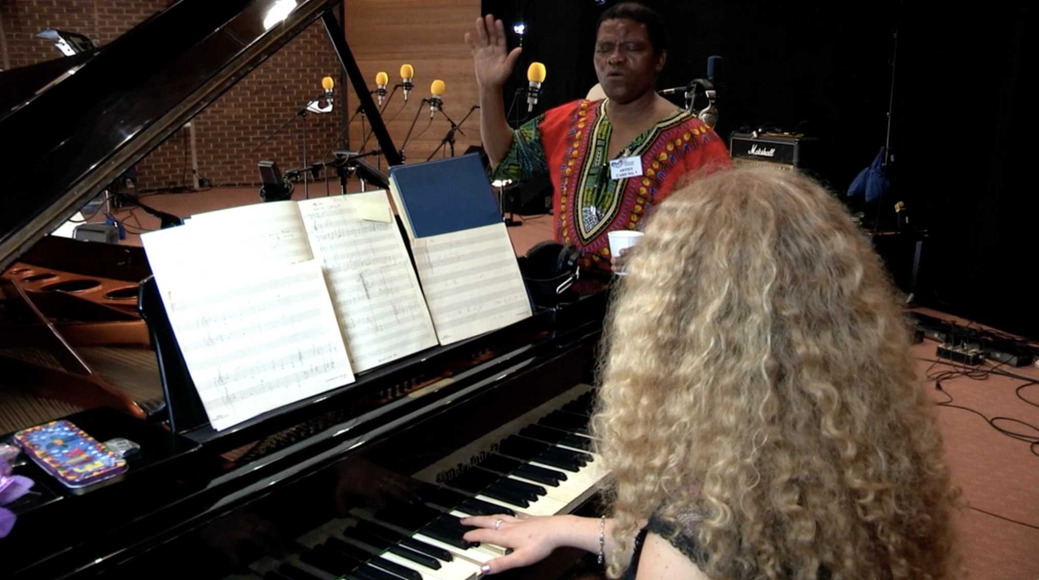 Joseph Shabalala and Ella Spira MBE composing the South African-inspired songs and Zulu harmonies of INALA